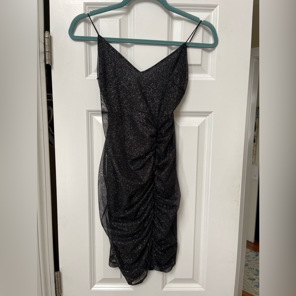 Black mini dress with silver sparkles